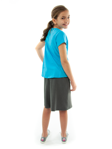 The Walking Culotte for Girls by Dressing For His Glory is a straight cut culotte. It has an elastic waistband and slit pockets. The culotte is extremely durable as well as comfortable. Perfect for hiking, bike riding, soccer games or just about any activity you have in mind!